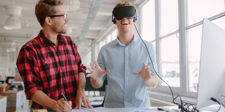 Two AR/VR developers testing out a virtual reality application.