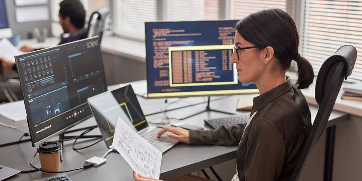 A big data engineer working at her desk.