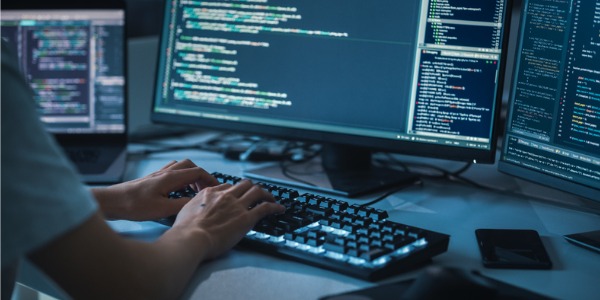 An e-commerce developer working on his computer.