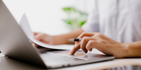 A grant writer working to secure funding.