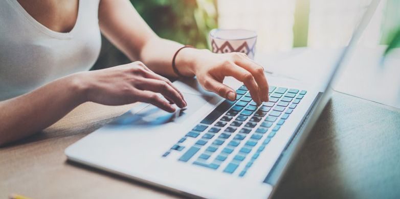 A content strategist working on her computer.
